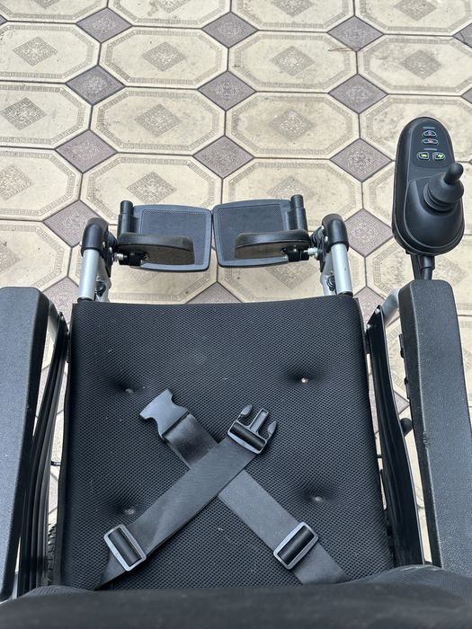 Электрическая инвалидная коляска