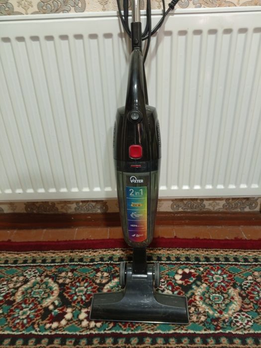 Пылесос вертикальный электрический.