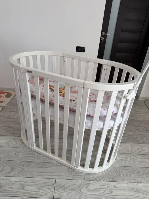 Vând pătuț bebe Marvis – oval/rotund, transformabil 9 în 1 – ALB