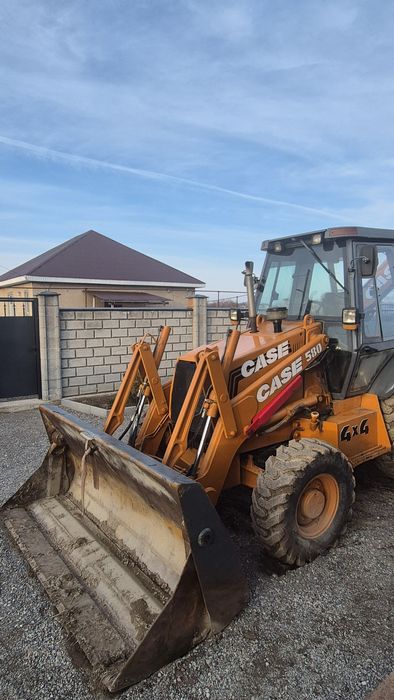 Трактор погрузчик