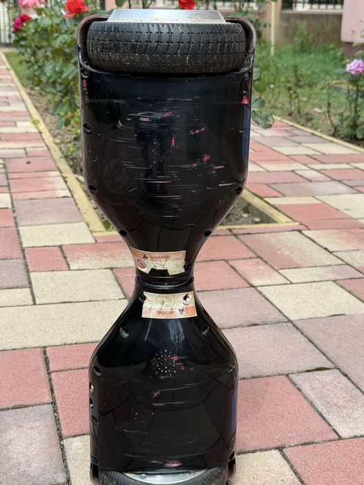 Hoverboard negru cu telecomandă – Distracție garantată la preț mic!