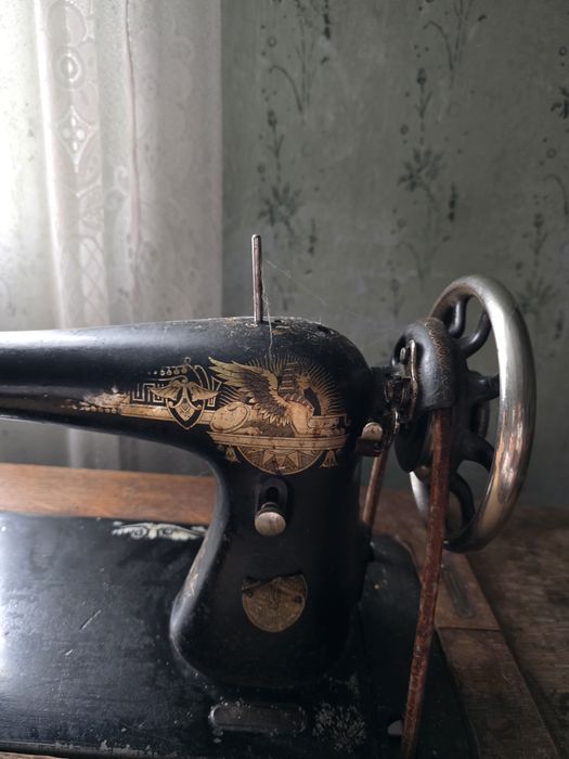 Mașin de cust Singer vechi pentru colecționari