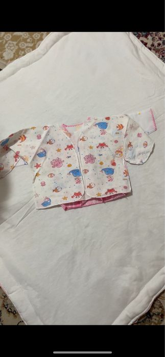 Одежды для новорожденных