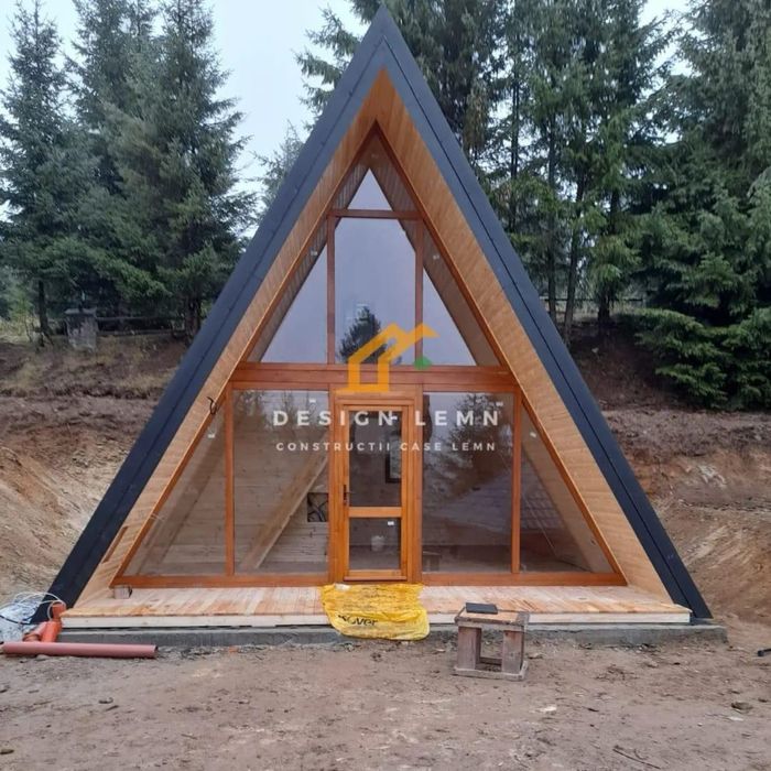 Case din lemn la cheie