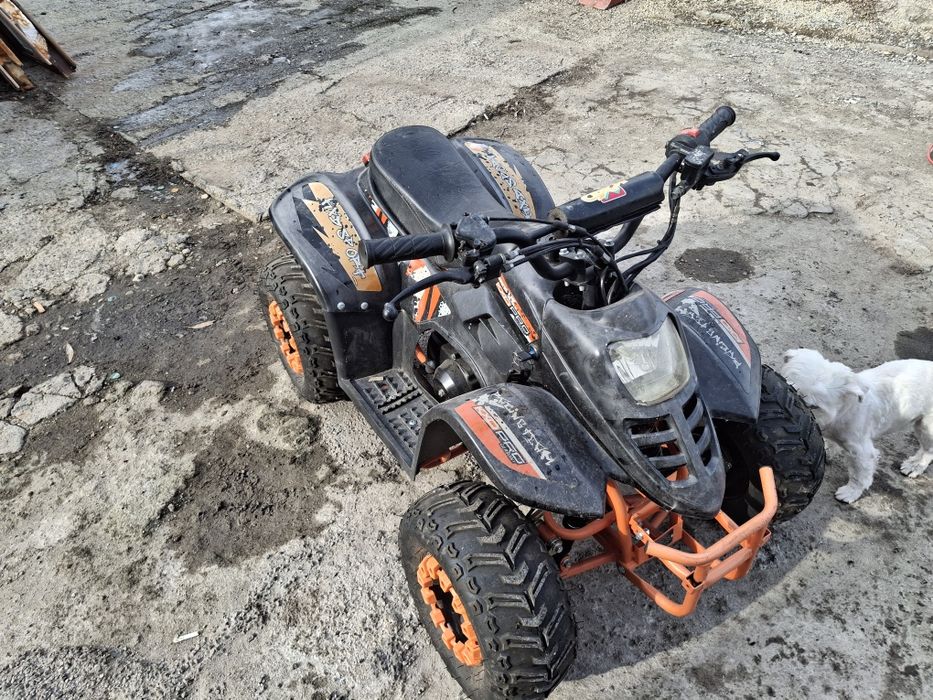 Vând atv  kxd pro .aproape nou 125