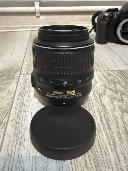 Nikon D3100 kit body + obiectiv AF‑S 18‑55mm VR + baterie EN‑EL14 + încărcător Patona