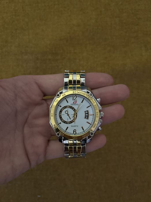 Ceas Geneva pentru cupluri.Din quartz,aur si argint. Niciodata purtat