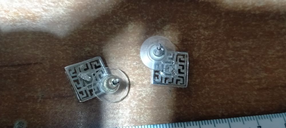 Кулоны, серёжки серебряные.