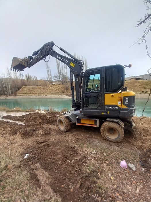 Экскаватор  хизмати