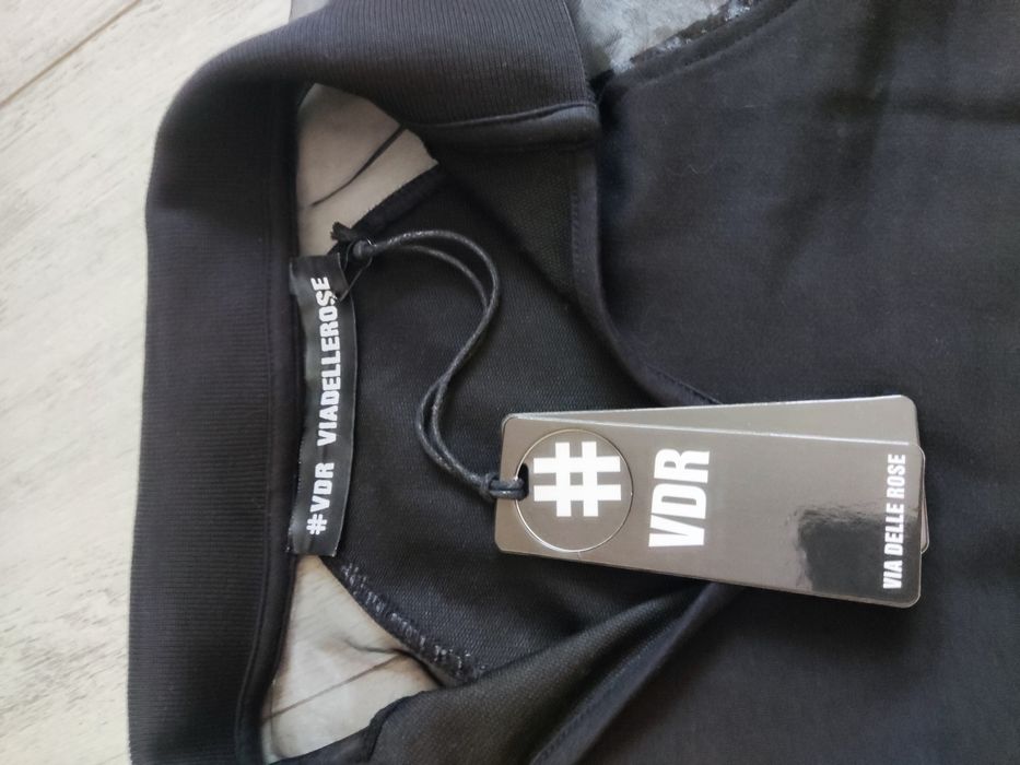 Боди на марката Paus