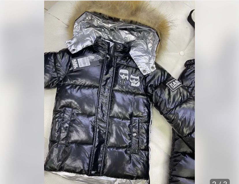 Продам новый фирменный комбинезон. Рр 110