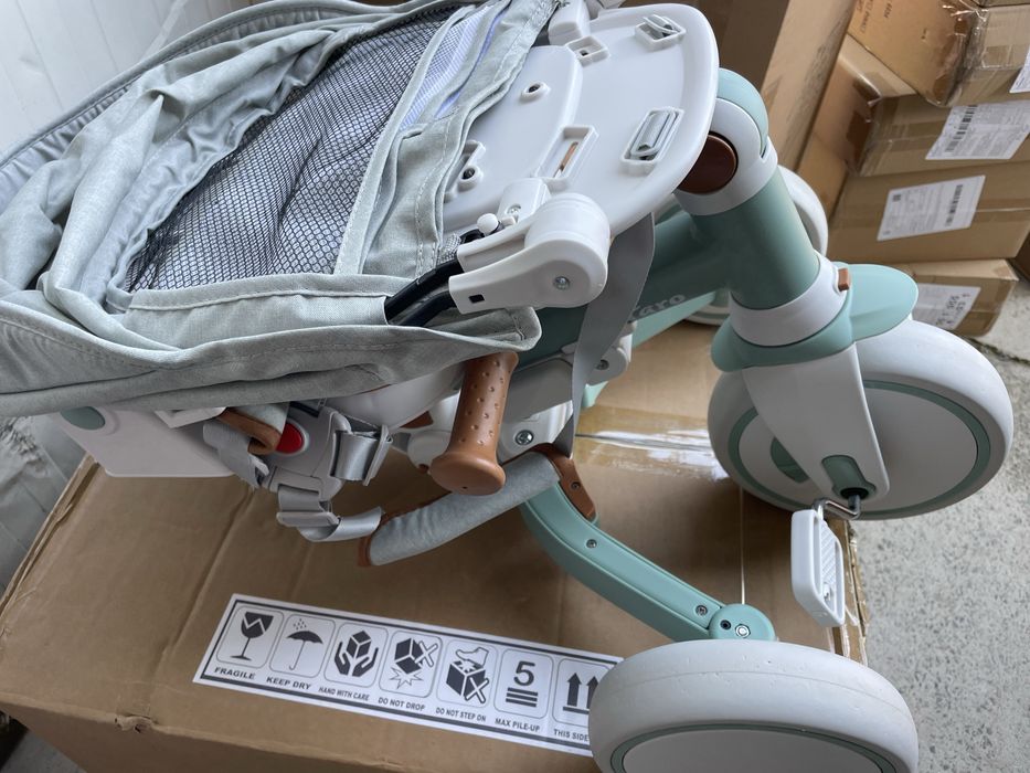 Tricicleta copii Toyz Faro Verde multifunctionala,ultrapliabila,spatar reglabil,scaun rotativ,maner reglabil in 4 pozitii,roti EVA,gentuta inclusa