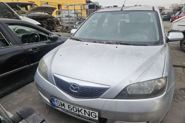 Oglinda stanga Mazda 2 2003 1.4 MZ-CD MT (68 hp)