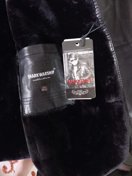 Кожаная новая куртка