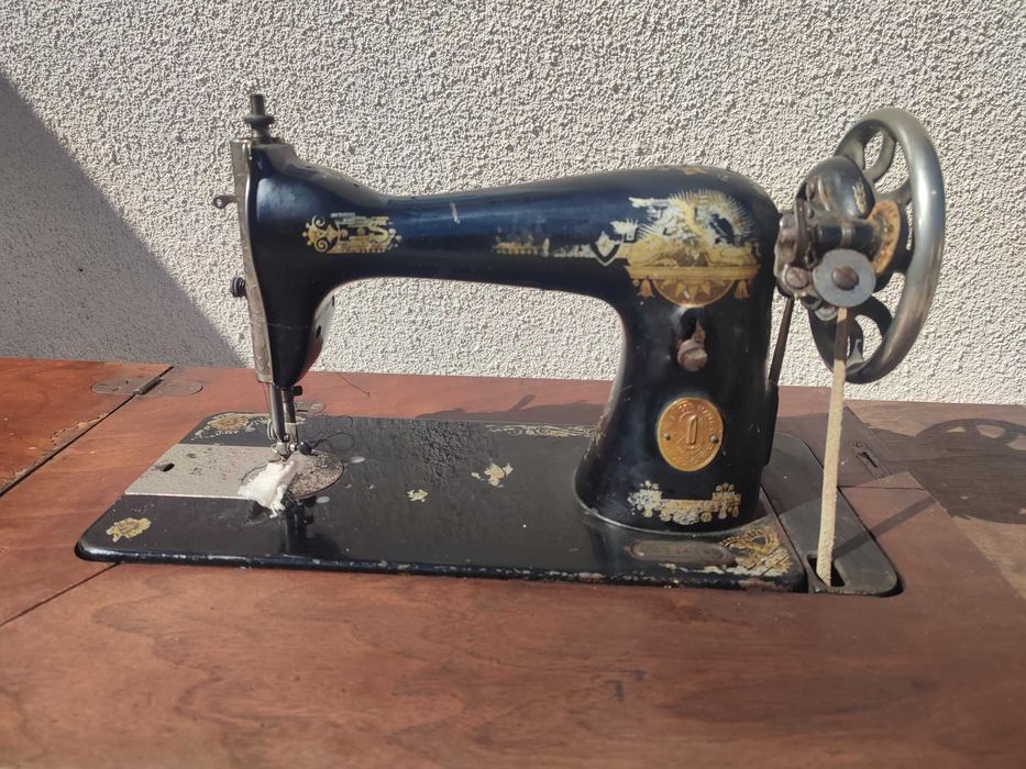 Mașina de cusut Singer