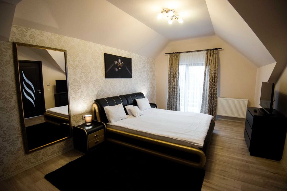 Inchiriere Camere si Apartamente cu si fara Jacuzzi in Vila