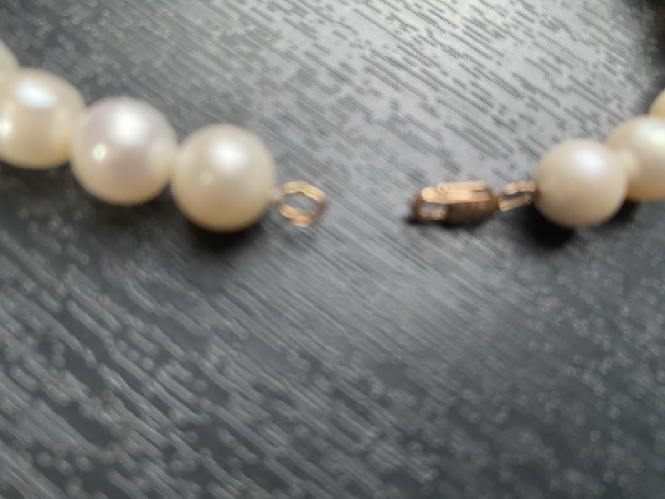 Асл аеллар тақинчоғи марварид