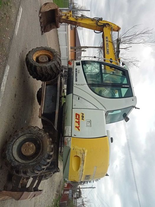 Vand/schimb Excavator New Holand MH City 16t