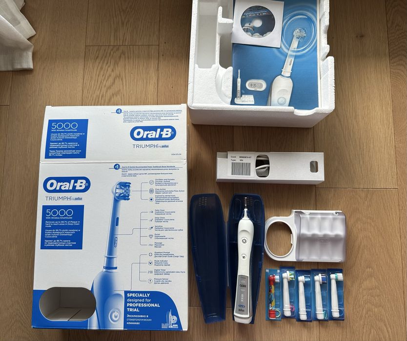 Periuta de dinti electrica Oral-B Braun Triumph 5000 + 5 rezerve capete