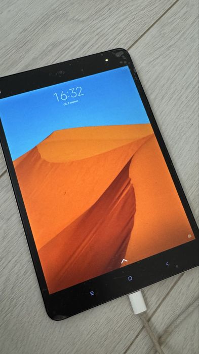 Планшет марка MI…………………………