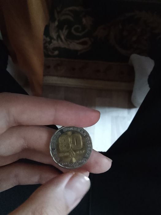 Продаю монету на 80леь