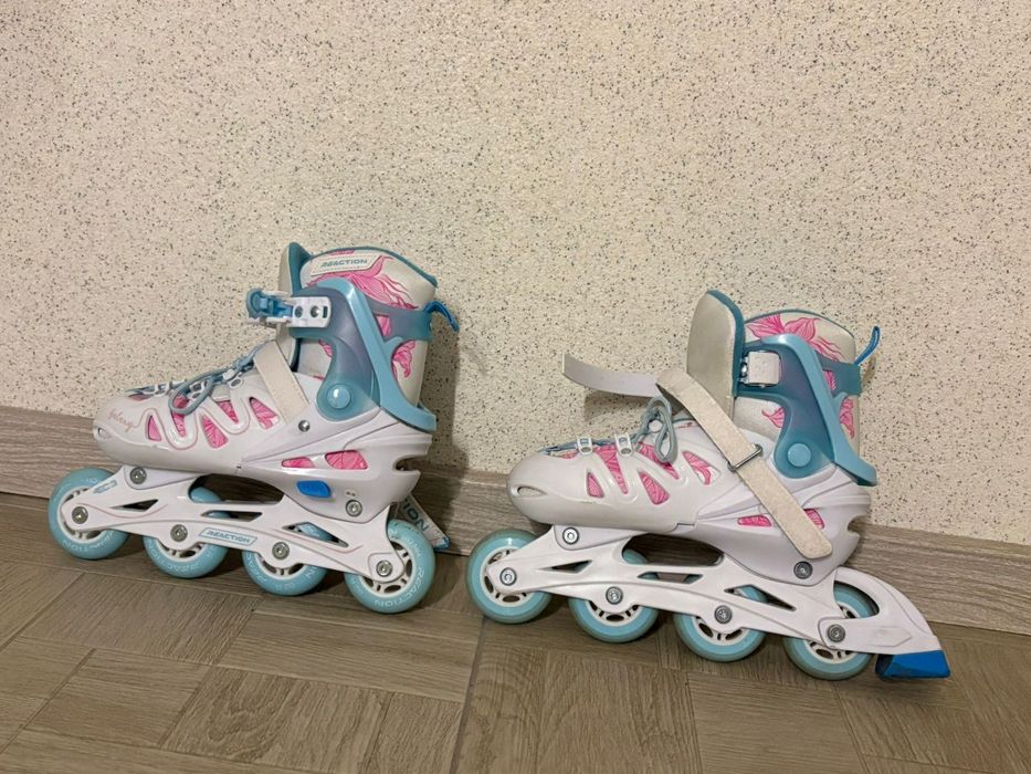 Роликовые коньки