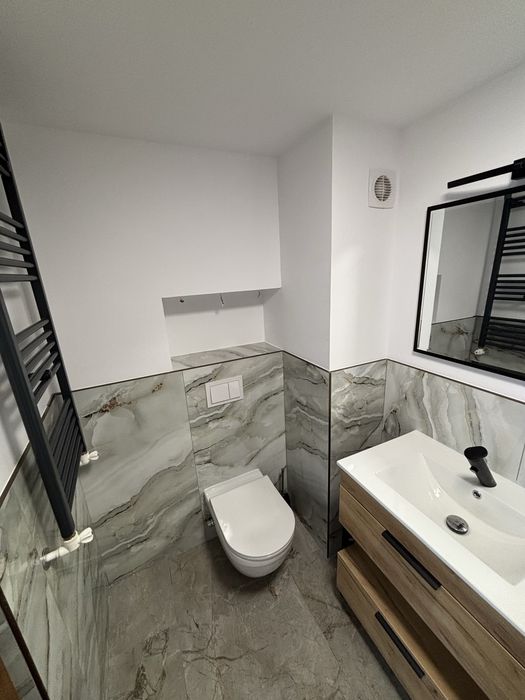 Apartament la casa cu curte
