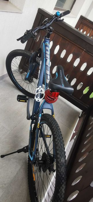 Bicicletă MTB Genio M573 27.5" – Ca Nouă + Pachet Complet Accesorii Cadou