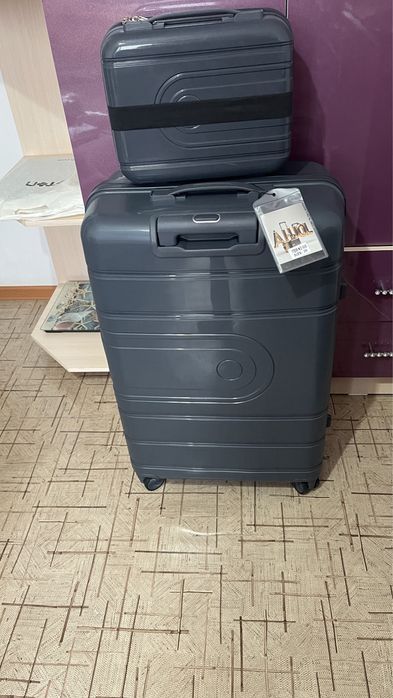 Чемоданы новые,материал полипропилен