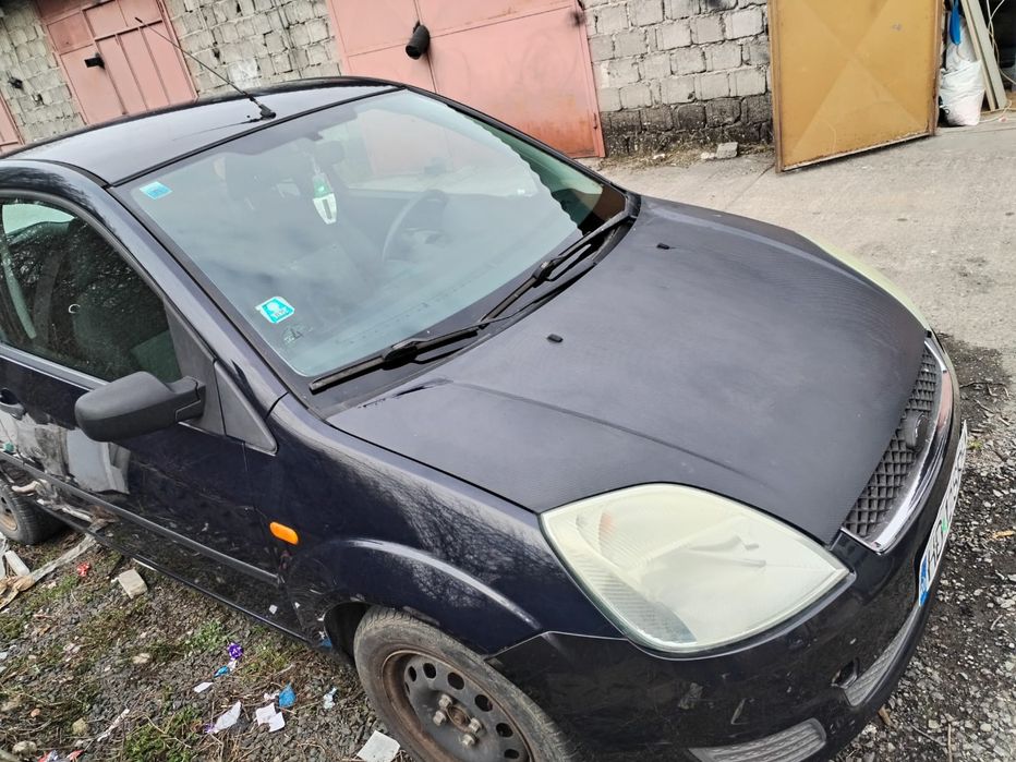 Vând  Ford  Fiesta 1.4 benzină