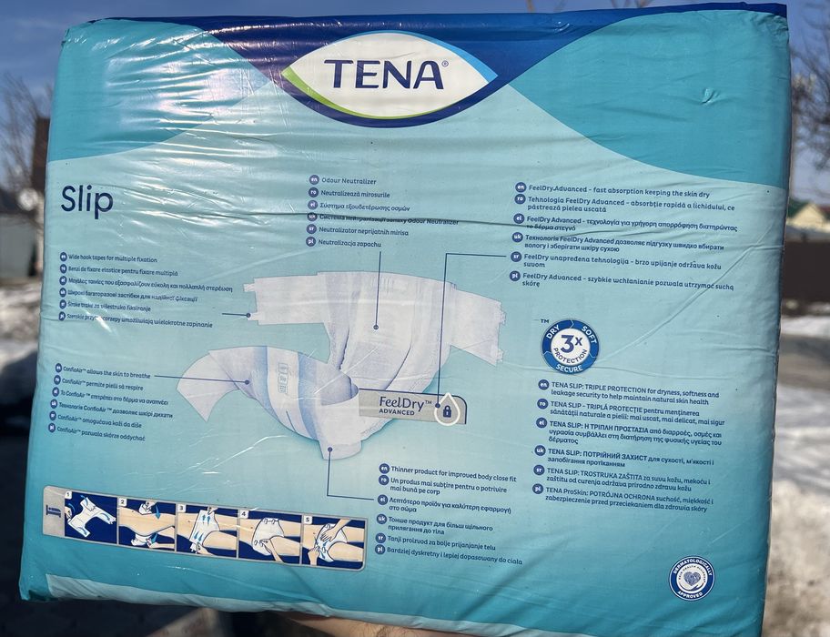 Продам памперсы Tena L размер