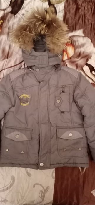 Продам зимний комбинезон  на мальчика