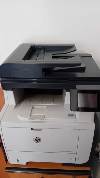 Imprimanta Multifunctional HP Laser Jet Pro M 521