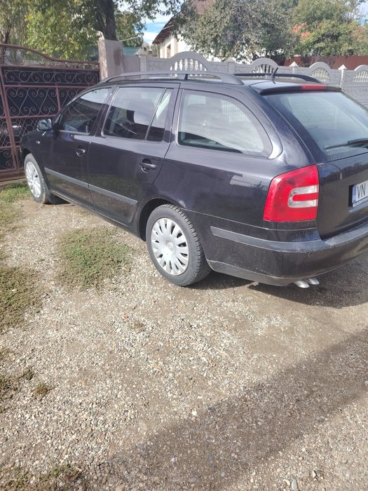 Vind scoda Octavia 2 lauriclement în stare foarte buna