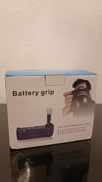 Продам батарейный грип BG-E14H
