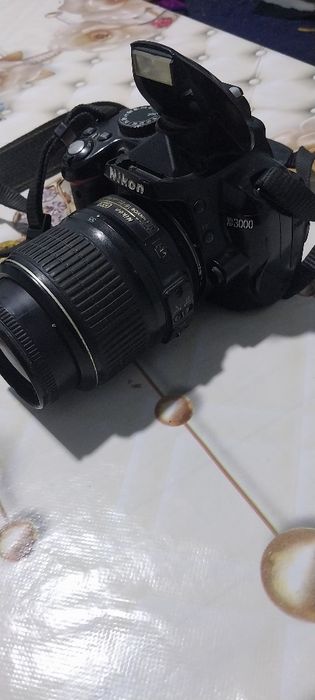 NIKON D3000 sotiĺadi
