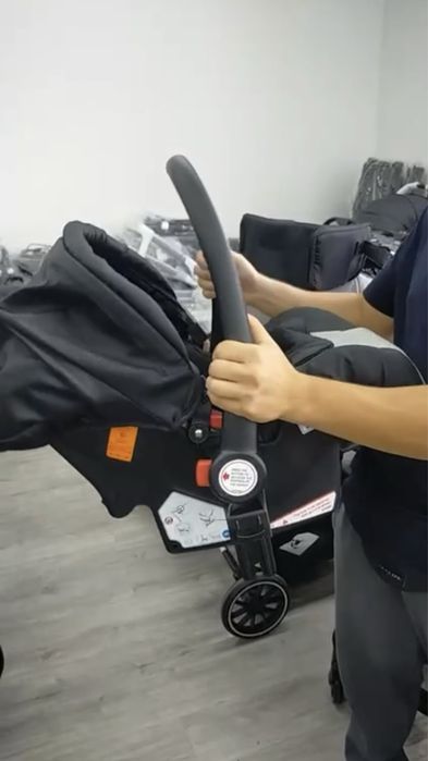 Детская коляска с автолюлькой