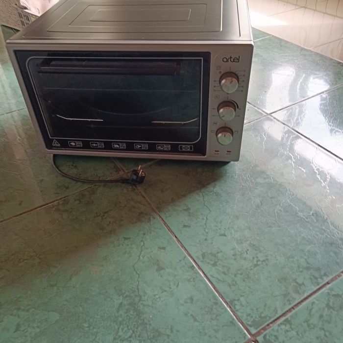 Продам печь artel