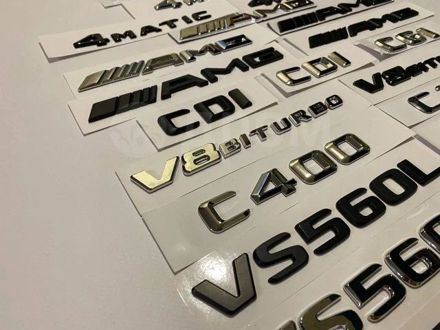 Эмблемы щильдики надписи на Mercedes-Benz Bmw land rover