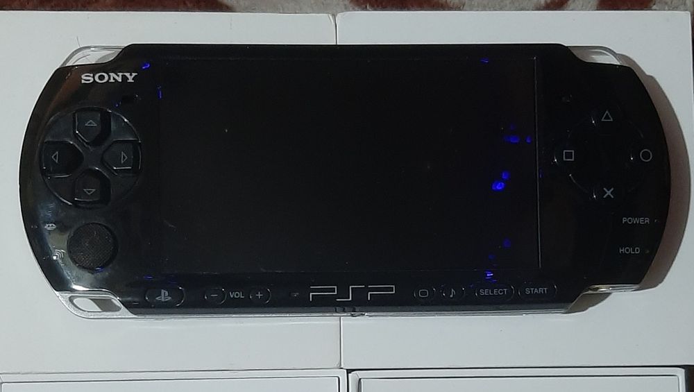 Vand psp în stare bună 3003 cu god of war