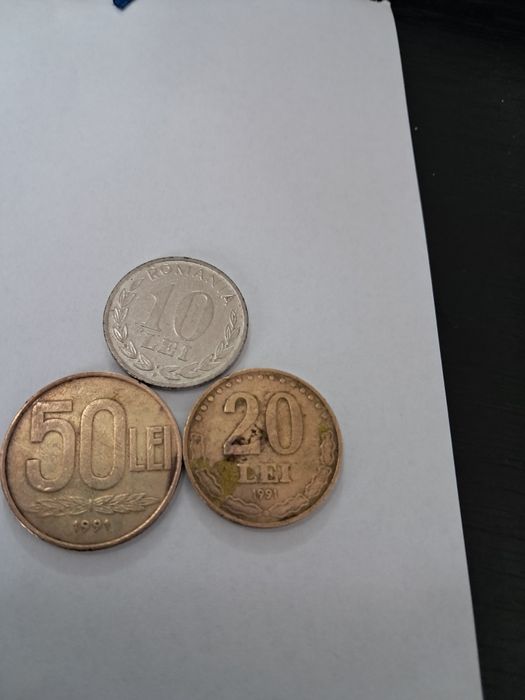 Vând monede de 1leu 3lei 5lei 10lei  20lei  50lei.
