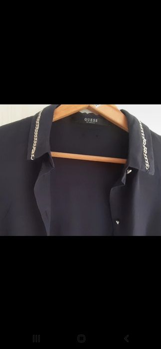 Cămașa Guess material f.usor placut. Masura 36