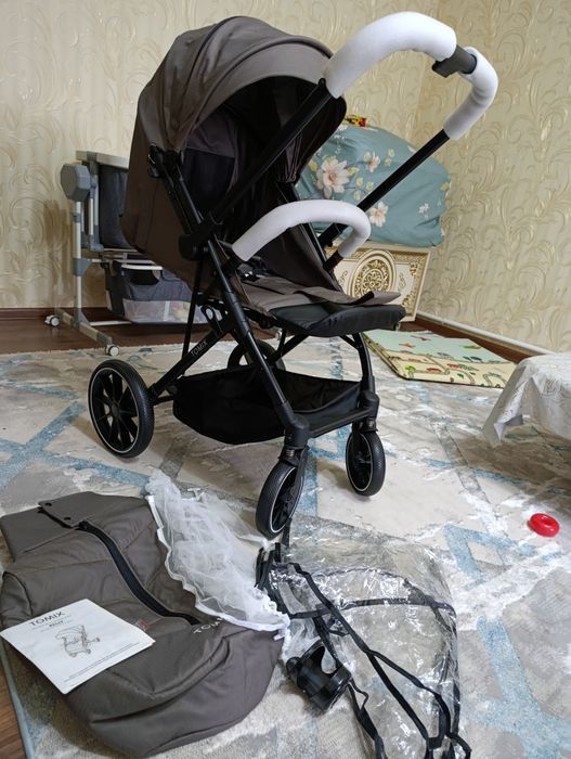 Продам новую коляску в упаковке Tomix Kelly!