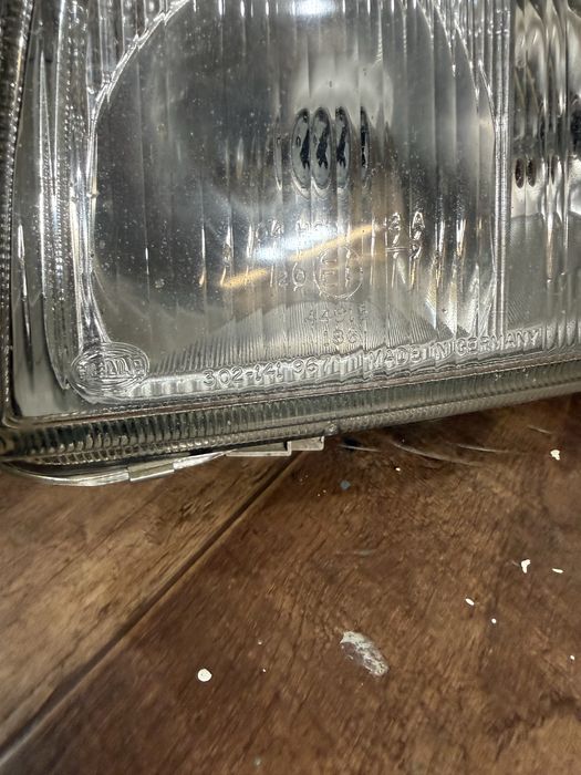 Фара пассат б4 левая hella оригинал