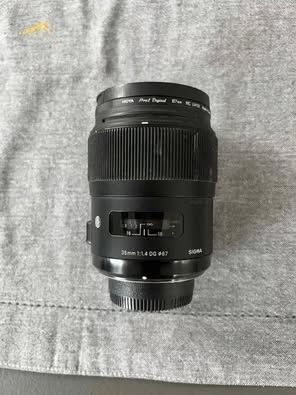 Obiectiv Sigma 35mm F1.4 DG + filtru hoya montura Nikon