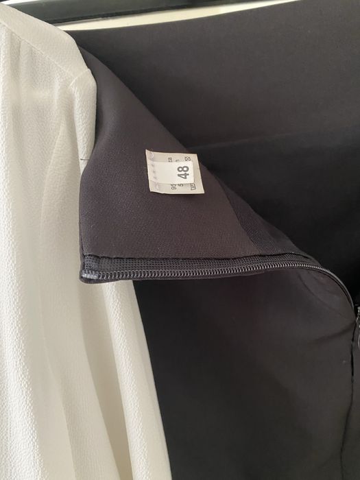 Set de 2 fuste conice si bluza eleganta cu dimensiuni afisate