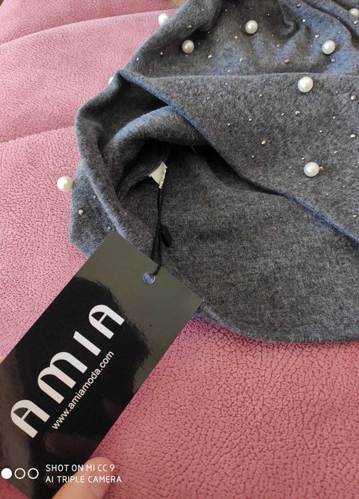 Amia Moda нова шапка с естествен пух