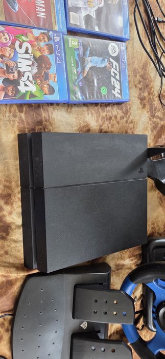 комплектPS4 + 2 джойстика + волан + 12 игри – Всичко работи!