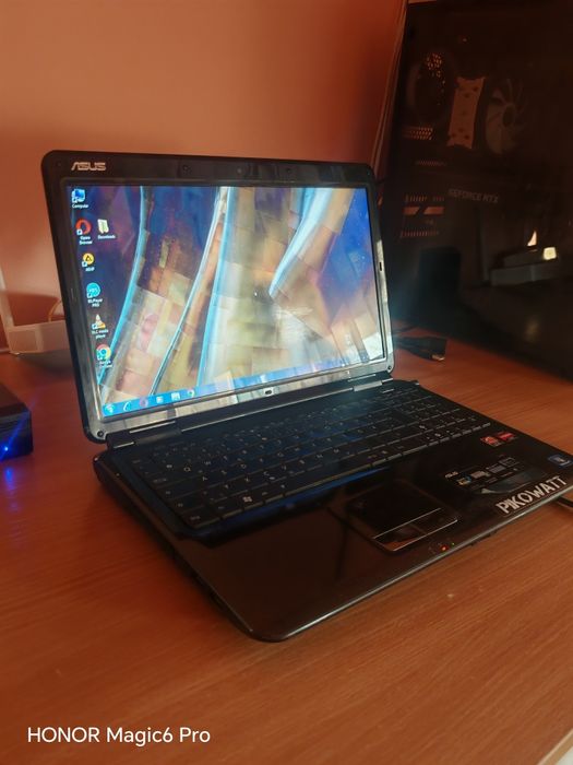 Laptop ASUS AMD Athlon Dual Core - Funcțional, cu cablu alimentare