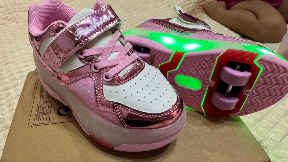 Кроссовки-ролики новые